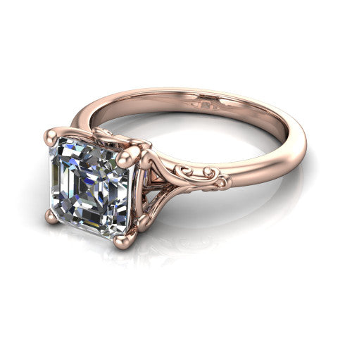 Dorothy square emerald vintage solitaire engagement ring in 14K Rose Gold, three-quarter perspective showing the square emerald center on claw prongs above a plain band with vintage filigree scrollwork