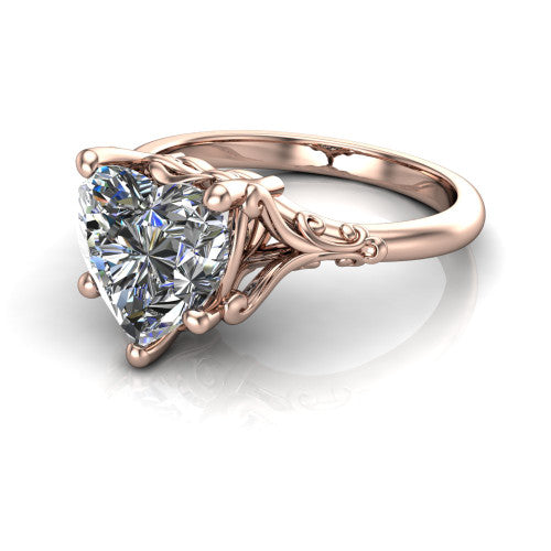 Dorothy heart vintage solitaire engagement ring in 18K Rose Gold, three-quarter perspective showing the heart center on claw prongs above a plain band with vintage filigree scrollwork