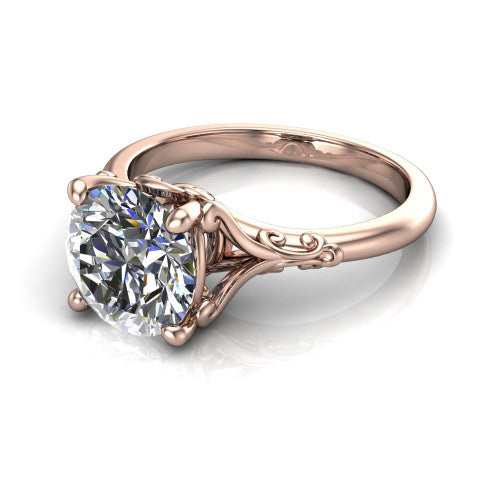 Dorothy round vintage solitaire engagement ring in 18K Rose Gold, three-quarter perspective showing the round center on claw prongs above a plain band with vintage filigree scrollwork