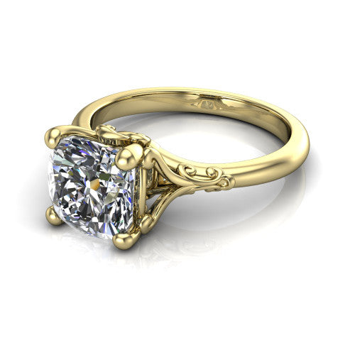 Dorothy cushion vintage solitaire engagement ring in 18K Yellow Gold, three-quarter perspective showing the cushion center on claw prongs above a plain band with vintage filigree scrollwork