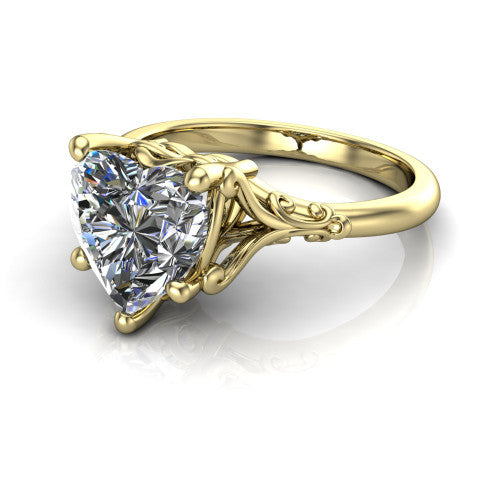 Dorothy heart vintage solitaire engagement ring in 14K Yellow Gold, three-quarter perspective showing the heart center on claw prongs above a plain band with vintage filigree scrollwork