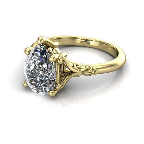 Dorothy pear vintage solitaire engagement ring in 14K Yellow Gold, three-quarter perspective showing the pear center on claw prongs above a plain band with vintage filigree scrollwork