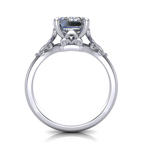 Dorothy emerald vintage solitaire engagement ring in 18K White Gold, through-finger front profile showing the filigree gallery beneath the emerald center