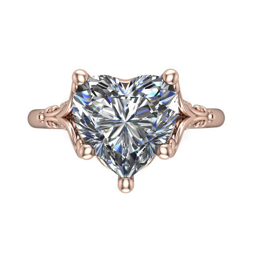 Dorothy heart vintage solitaire engagement ring in 18K Rose Gold, top-down view showing the heart solitaire center and the filigree scrollwork flanking the head