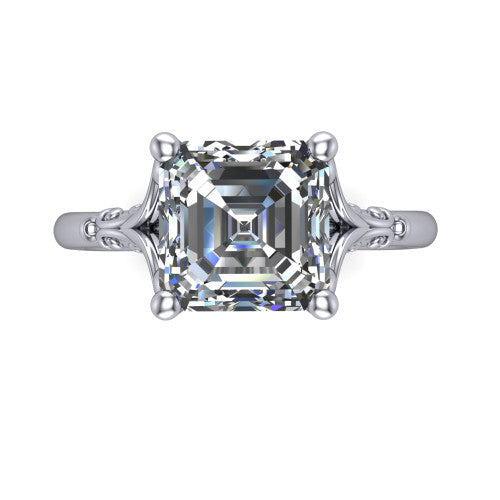 Dorothy square emerald vintage solitaire engagement ring in Platinum, top-down view showing the square emerald solitaire center and the filigree scrollwork flanking the head