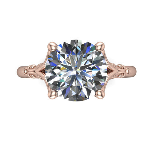 Dorothy round vintage solitaire engagement ring in 18K Rose Gold, top-down view showing the round solitaire center and the filigree scrollwork flanking the head