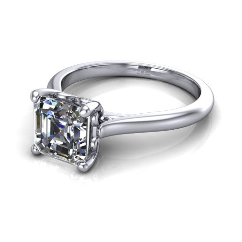 Margaret square emerald classic solitaire engagement ring in Platinum, three-quarter perspective showing the square emerald center on claw prongs above a plain polished band