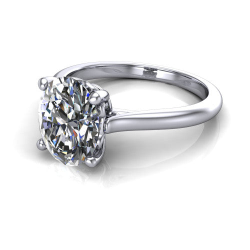 Margaret oval classic solitaire engagement ring in Platinum, three-quarter perspective showing the oval center on claw prongs above a plain polished band