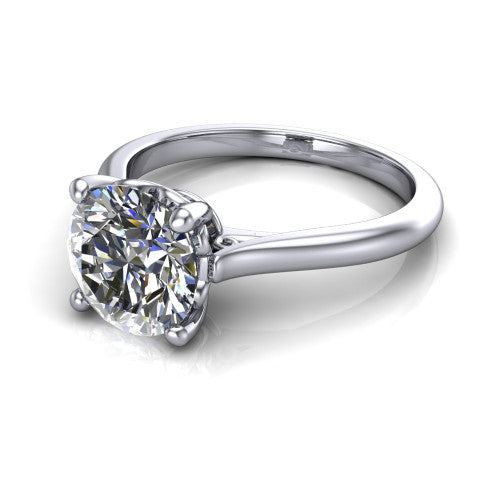 Margaret round classic solitaire engagement ring in 14K White Gold, three-quarter perspective showing the round center on claw prongs above a plain polished band