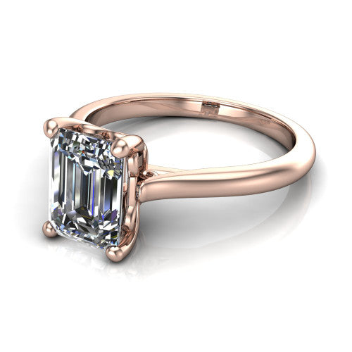 Margaret emerald classic solitaire engagement ring in 14K Rose Gold, three-quarter perspective showing the emerald center on claw prongs above a plain polished band