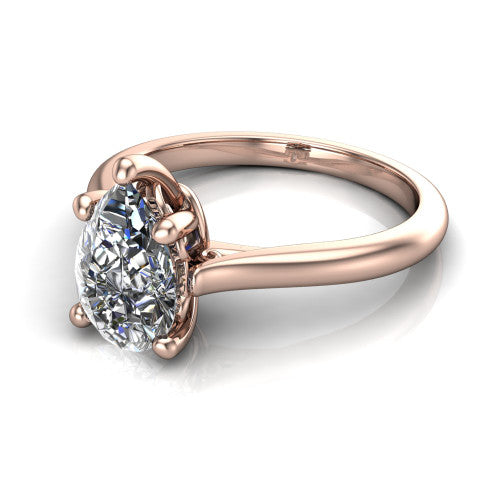 Margaret pear classic solitaire engagement ring in 18K Rose Gold, three-quarter perspective showing the pear center on claw prongs above a plain polished band