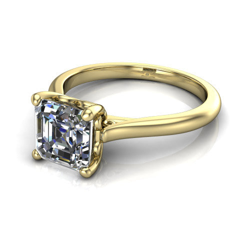 Margaret square emerald classic solitaire engagement ring in 18K Yellow Gold, three-quarter perspective showing the square emerald center on claw prongs above a plain polished band