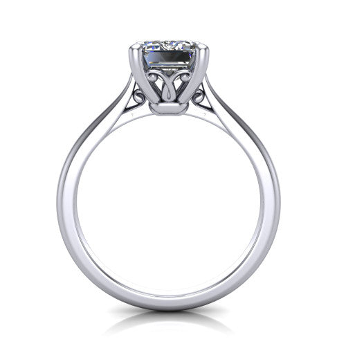 Margaret emerald classic solitaire engagement ring in 18K White Gold, through-finger front profile showing the filigree basket beneath the emerald center