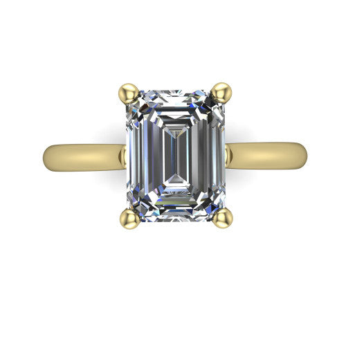 Margaret emerald classic solitaire engagement ring in 14K Yellow Gold, top-down view showing the four-prong emerald solitaire center