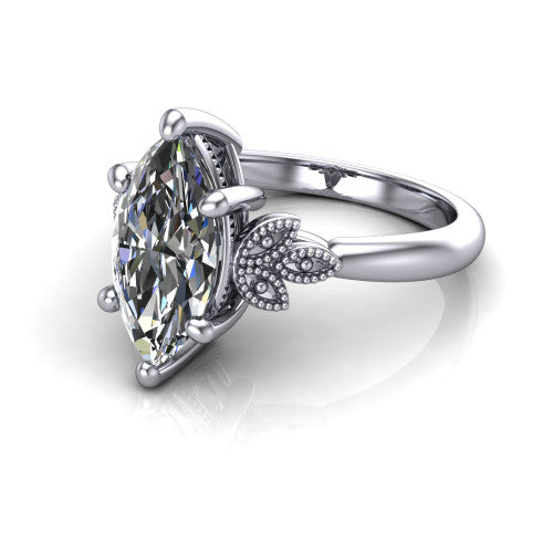 Athena marquise vintage solitaire engagement ring in 18K White Gold, three-quarter perspective showing the marquise center on claw prongs above a plain band with fleur-de-lis filigree accents
