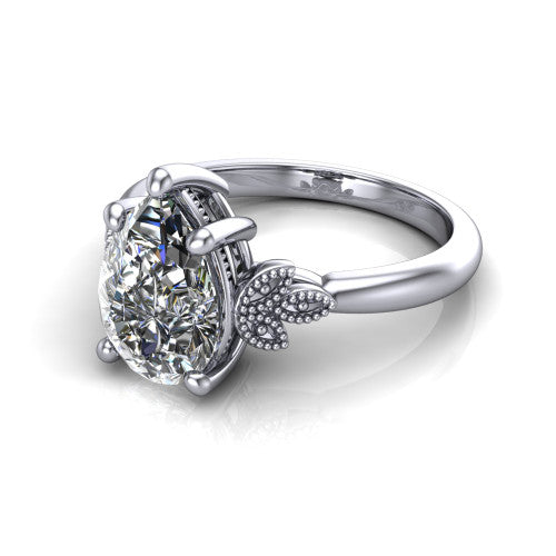 Athena pear vintage solitaire engagement ring in Platinum, three-quarter perspective showing the pear center on claw prongs above a plain band with fleur-de-lis filigree accents
