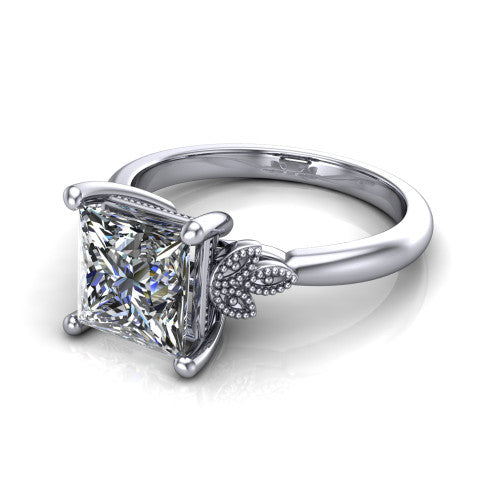 Athena princess vintage solitaire engagement ring in 14K White Gold, three-quarter perspective showing the princess center on claw prongs above a plain band with fleur-de-lis filigree accents