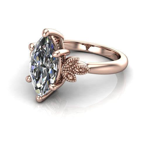 Athena marquise vintage solitaire engagement ring in 14K Rose Gold, three-quarter perspective showing the marquise center on claw prongs above a plain band with fleur-de-lis filigree accents