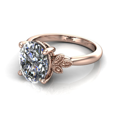 Athena oval vintage solitaire engagement ring in 14K Rose Gold, three-quarter perspective showing the oval center on claw prongs above a plain band with fleur-de-lis filigree accents