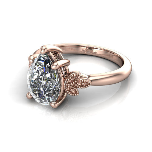 Athena pear vintage solitaire engagement ring in 14K Rose Gold, three-quarter perspective showing the pear center on claw prongs above a plain band with fleur-de-lis filigree accents