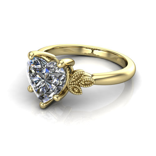 Athena heart vintage solitaire engagement ring in 18K Yellow Gold, three-quarter perspective showing the heart center on claw prongs above a plain band with fleur-de-lis filigree accents