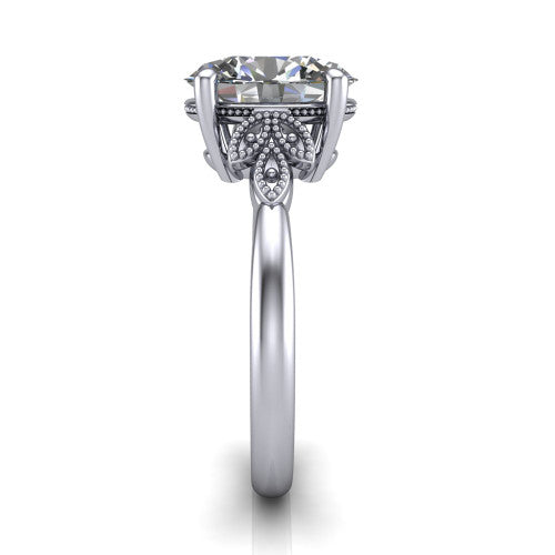 Athena oval vintage solitaire engagement ring in Platinum, side profile showing the fleur-de-lis filigree accents, milgrain detail, and plain band in profile