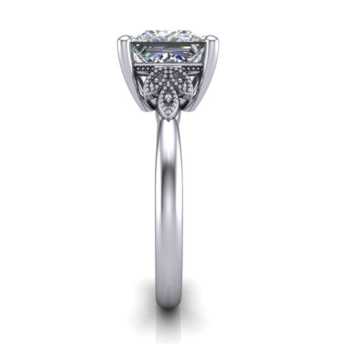 Athena princess vintage solitaire engagement ring in 18K White Gold, side profile showing the fleur-de-lis filigree accents, milgrain detail, and plain band in profile