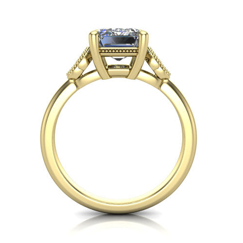 Athena emerald vintage solitaire engagement ring in 14K Yellow Gold, through-finger front profile showing the filigree gallery beneath the emerald center