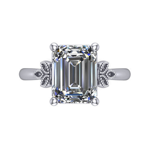 Athena emerald vintage solitaire engagement ring in Platinum, top-down view showing the emerald solitaire center and the fleur-de-lis filigree flanking the head
