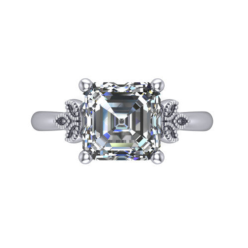 Athena square emerald vintage solitaire engagement ring in 18K White Gold, top-down view showing the square emerald solitaire center and the fleur-de-lis filigree flanking the head