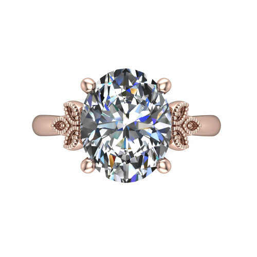 Athena oval vintage solitaire engagement ring in 18K Rose Gold, top-down view showing the oval solitaire center and the fleur-de-lis filigree flanking the head