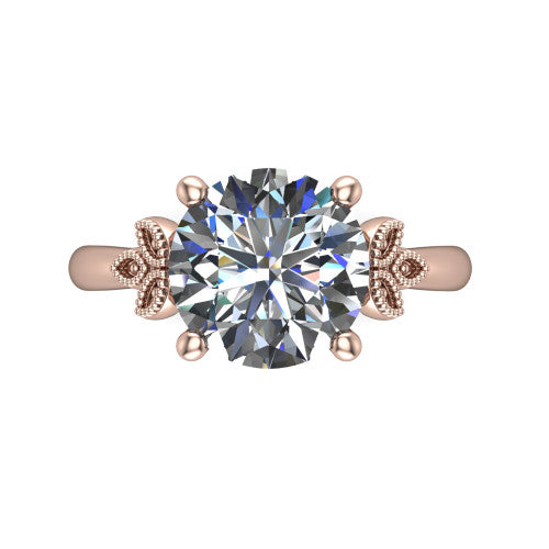 Athena round vintage solitaire engagement ring in 18K Rose Gold, top-down view showing the round solitaire center and the fleur-de-lis filigree flanking the head