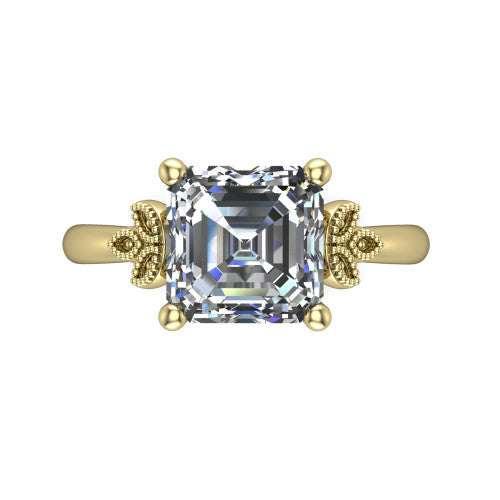 Athena square emerald vintage solitaire engagement ring in 18K Yellow Gold, top-down view showing the square emerald solitaire center and the fleur-de-lis filigree flanking the head