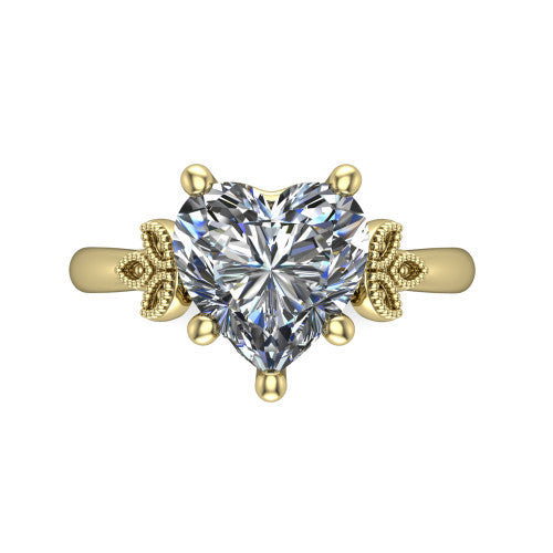 Athena heart vintage solitaire engagement ring in 18K Yellow Gold, top-down view showing the heart solitaire center and the fleur-de-lis filigree flanking the head