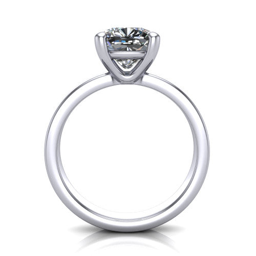 Louise cushion classic solitaire engagement ring in Platinum, through-finger front profile showing the cushion center raised above the wide flat band