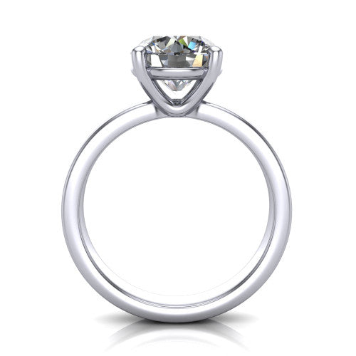 Louise round classic solitaire engagement ring in 18K White Gold, through-finger front profile showing the round center raised above the wide flat band