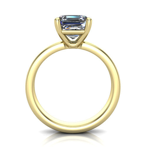 Louise square emerald classic solitaire engagement ring in 14K Yellow Gold, through-finger front profile showing the square emerald center raised above the wide flat band