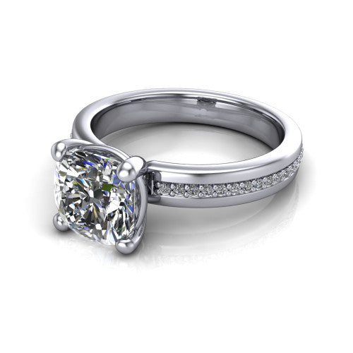 Kamala cushion classic solitaire engagement ring in 18K White Gold, three-quarter perspective showing the cushion center on claw prongs above a wide channel-set pav&eacute; band