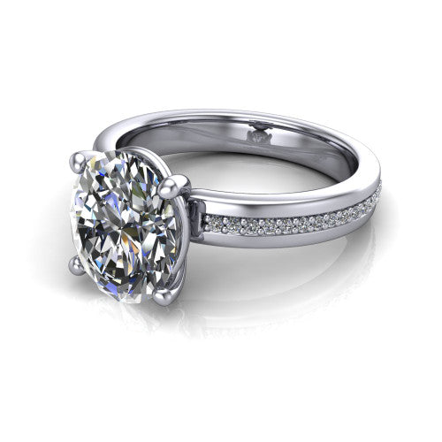 Kamala oval classic solitaire engagement ring in 14K White Gold, three-quarter perspective showing the oval center on claw prongs above a wide channel-set pav&eacute; band