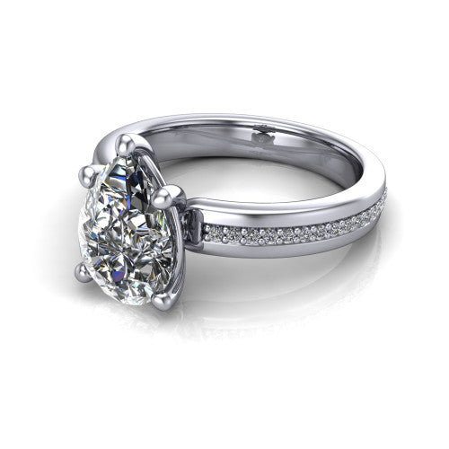 Kamala pear classic solitaire engagement ring in 18K White Gold, three-quarter perspective showing the pear center on claw prongs above a wide channel-set pav&eacute; band