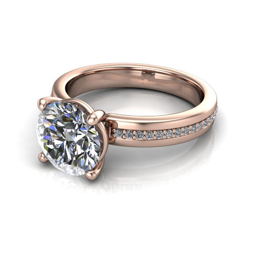 Kamala round classic solitaire engagement ring in 14K Rose Gold, three-quarter perspective showing the round center on claw prongs above a wide channel-set pav&eacute; band