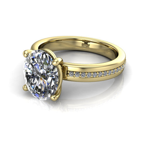 Kamala oval classic solitaire engagement ring in 14K Yellow Gold, three-quarter perspective showing the oval center on claw prongs above a wide channel-set pav&eacute; band