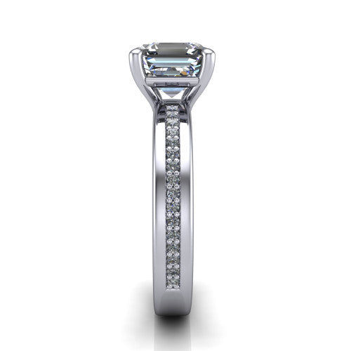 Kamala square emerald classic solitaire engagement ring in 18K White Gold, side profile showing the wide channel-set pav&eacute; band with high-polish edges and the open basket