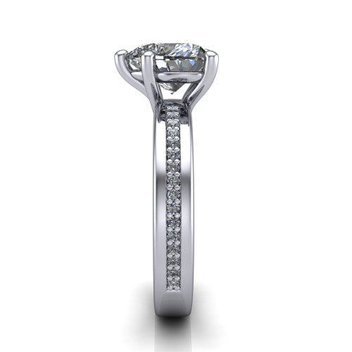 Kamala heart classic solitaire engagement ring in 18K White Gold, side profile showing the wide channel-set pav&eacute; band with high-polish edges and the open basket