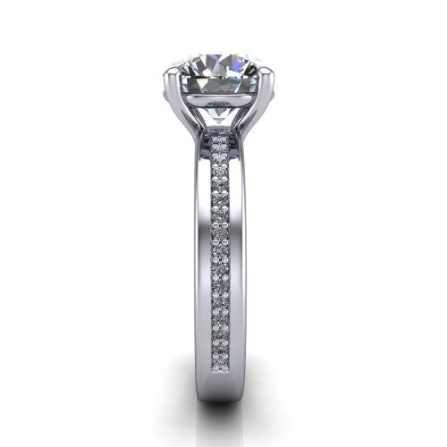 Kamala round classic solitaire engagement ring in 14K White Gold, side profile showing the wide channel-set pav&eacute; band with high-polish edges and the open basket