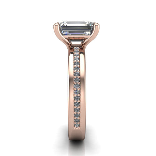 Kamala emerald classic solitaire engagement ring in 14K Rose Gold, side profile showing the wide channel-set pav&eacute; band with high-polish edges and the open basket