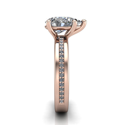 Kamala pear classic solitaire engagement ring in 18K Rose Gold, side profile showing the wide channel-set pav&eacute; band with high-polish edges and the open basket