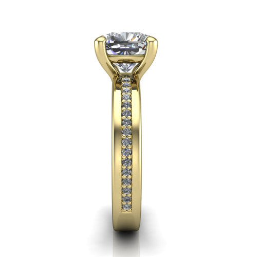 Kamala cushion classic solitaire engagement ring in 18K Yellow Gold, side profile showing the wide channel-set pav&eacute; band with high-polish edges and the open basket