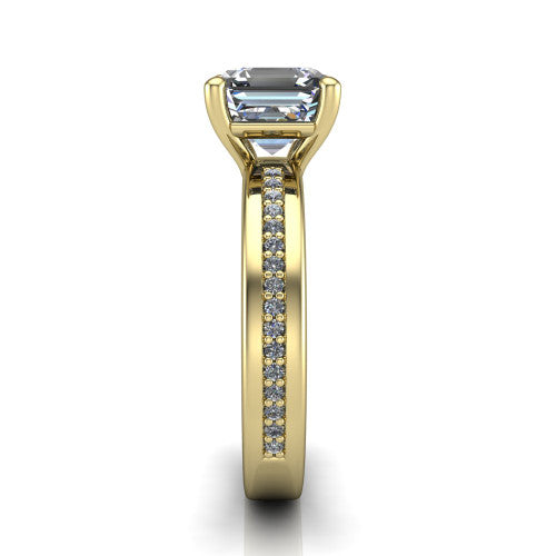 Kamala square emerald classic solitaire engagement ring in 18K Yellow Gold, side profile showing the wide channel-set pav&eacute; band with high-polish edges and the open basket