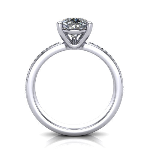 Kamala pear classic solitaire engagement ring in Platinum, through-finger front profile showing the pear center raised above the channel-set band